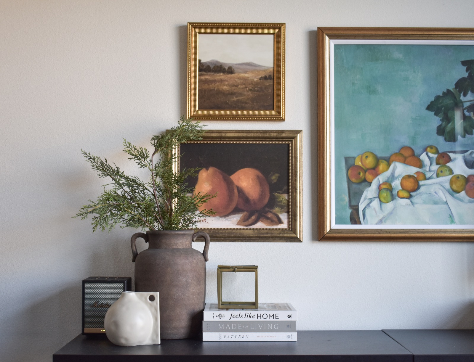 Styled gallery wall and console