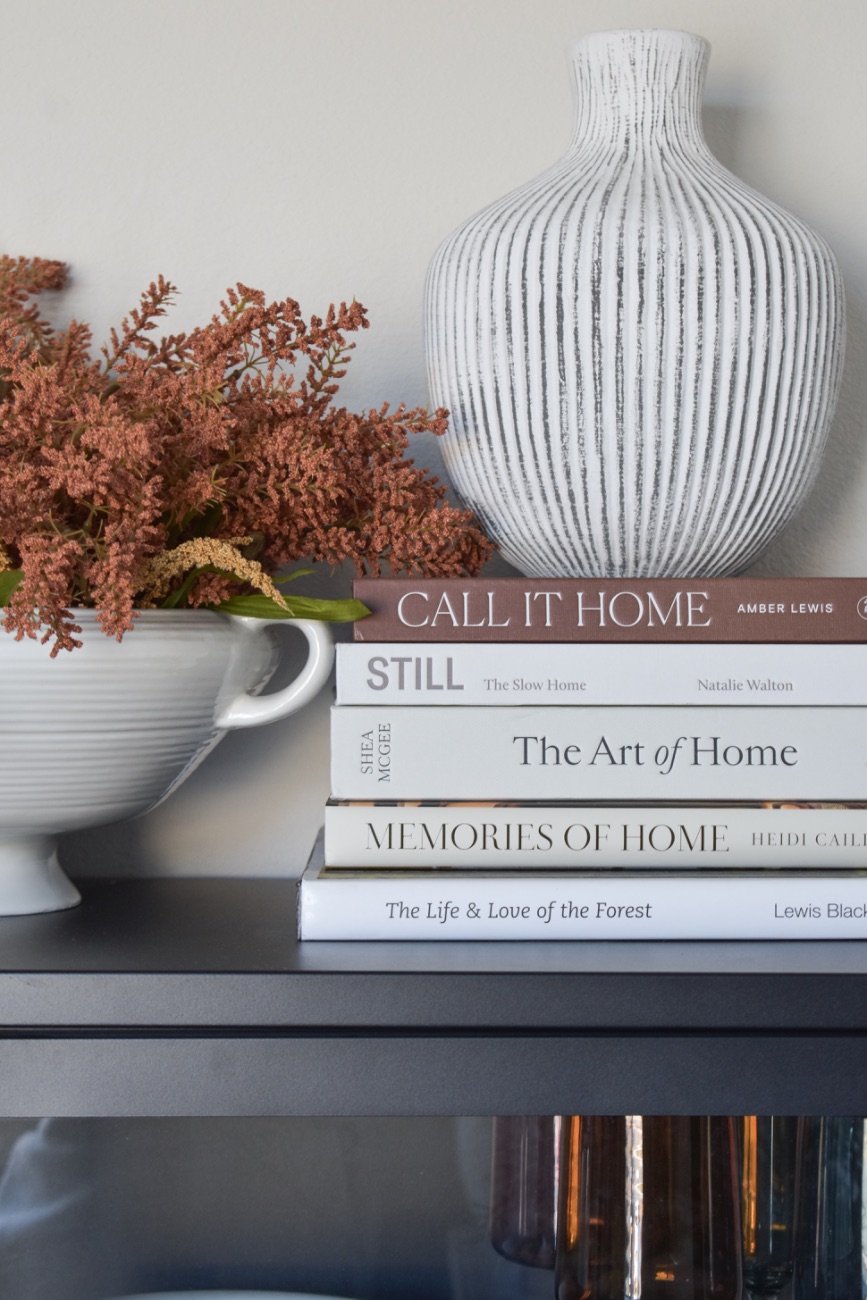 Vintage books and styling on a credenza